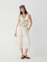 Textured Mid Rise Lace Panel Ruffle Hem Capri Shorts