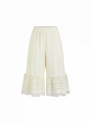 Textured Mid Rise Lace Panel Ruffle Hem Capri Shorts