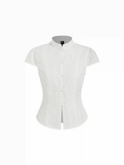 Blusa de manga corta con cuello mandarín y botones de nudo