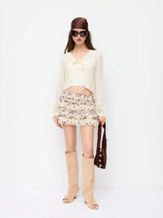Knit V-Neck Knotted Hollow Out Bell Sleeve Cropped Oversized Top