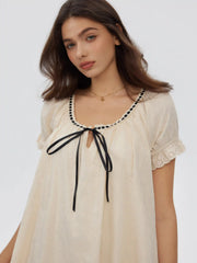 Cotton-blend Puff Sleeve Twist Knotted Scoop Neck Smock Mini Dress